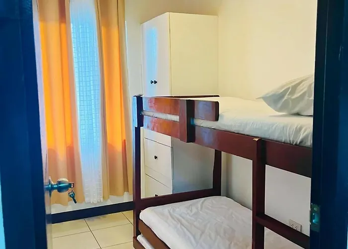 Two-bedroom Near Sm , It Park & Ayala Mall - N0 Parking At Urban Deca Homes
